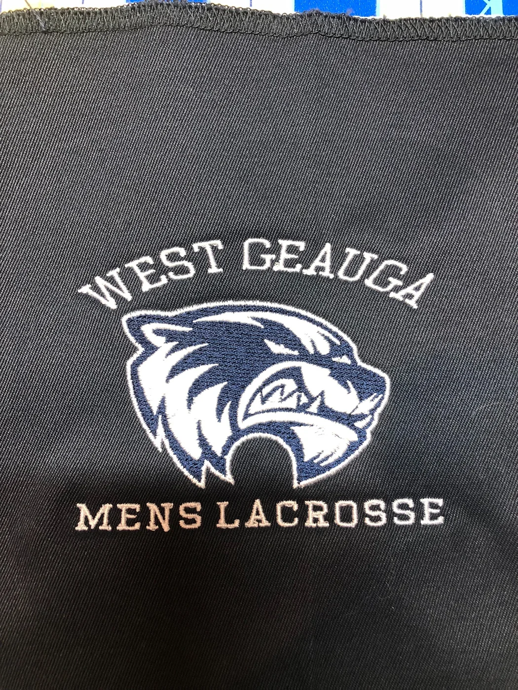 West Geauga men's lacrosse embroidered logo